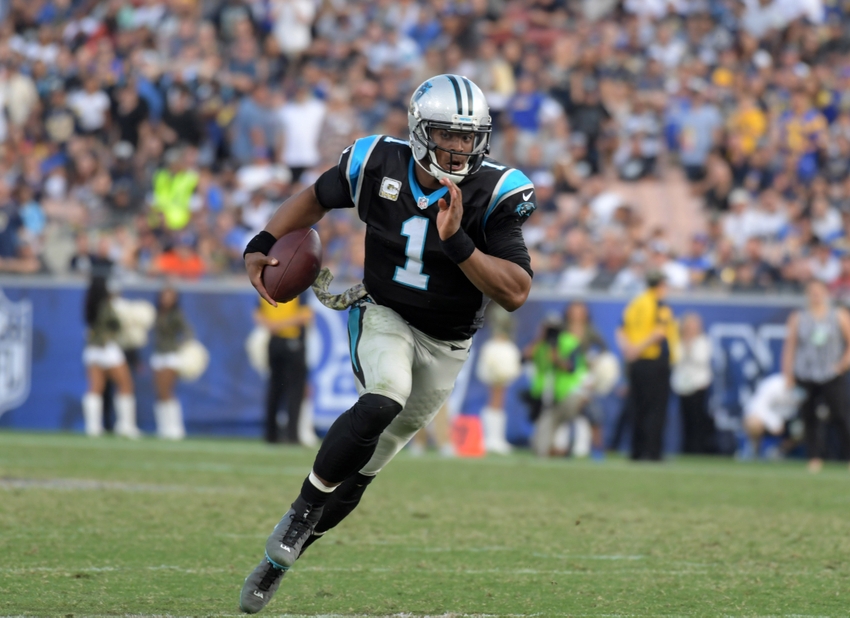 Nov 6, 2016; Los Angeles, CA, USA; Carolina Panthers quarterback Cam Newton (1) carries the ball against the Los Angeles Rams during a NFL football game at Los Angeles Memorial Coliseum. The Panthers defeated the Rams 13-10. Mandatory Credit: Kirby Lee-USA TODAY Sports