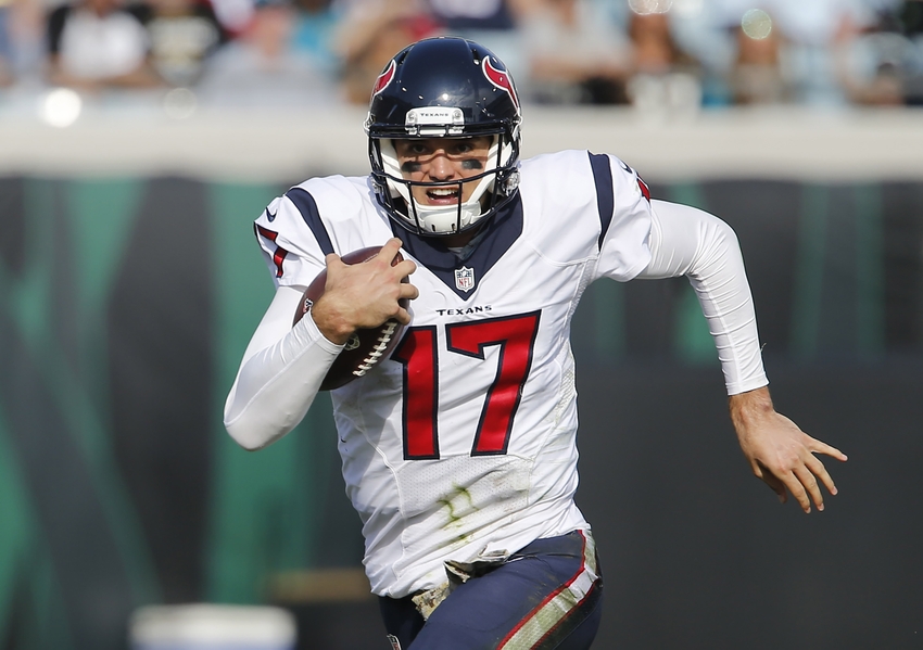 Nov 13, 2016; Jacksonville, FL, USA; Houston Texans quarterback Brock Osweiler (17) runs the ball on a keeper during the second quarter of a football game against the Jacksonville Jaguars at EverBank Field. Mandatory Credit: Reinhold Matay-USA TODAY Sports