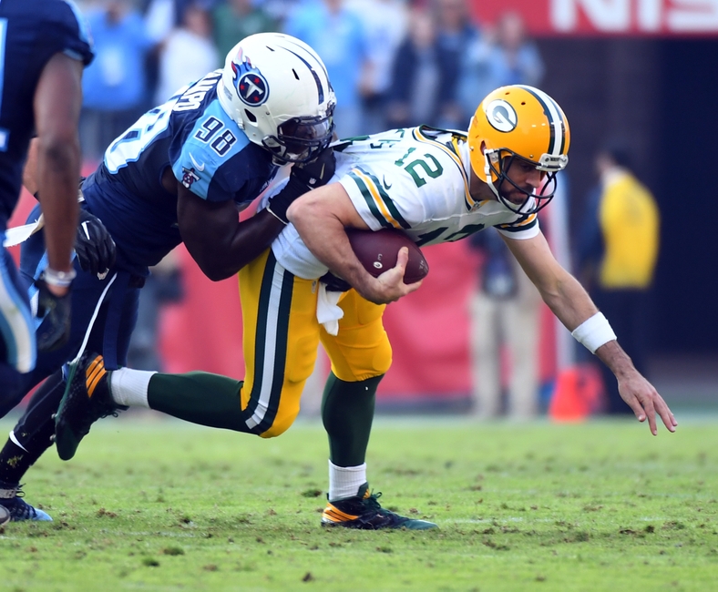 Nov 13, 2016; Nashville, TN, USA; Green Bay Packers quarterback Aaron Rodgers (12) is sacked by Tennessee Titans linebacker Brian Orakpo (98) during the second half at Nissan Stadium. The Titans won 47-25. Mandatory Credit: Christopher Hanewinckel-USA TODAY Sports