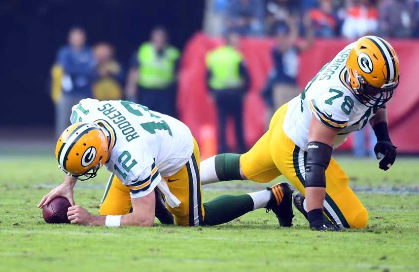 Nov 13, 2016; Nashville, TN, USA; Green Bay Packers quarterback Aaron Rodgers (12) and tackle Jason Spriggs (78) react after a sack during the second half against the Tennessee Titans at Nissan Stadium. The Titans won 47-25. Mandatory Credit: Christopher Hanewinckel-USA TODAY Sports