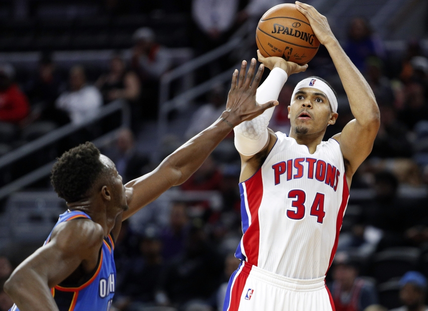 Nov 14, 2016; Auburn Hills, MI, USA; Detroit Pistons forward Tobias Harris (34) takes a shot over Oklahoma City Thunder forward Jerami Grant (9) during the third quarter at The Palace of Auburn Hills. Pistons won 104-88. Mandatory Credit: Raj Mehta-USA TODAY Sports