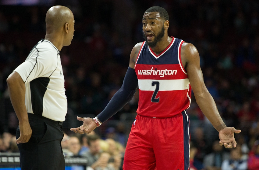 Nov 16, 2016; Philadelphia, PA, USA; Washington Wizards guard John Wall (2) pleads with referee Derrick Stafford (9) during the second half against the Philadelphia 76ers at Wells Fargo Center. The Philadelphia 76ers won 109-102. Mandatory Credit: Bill Streicher-USA TODAY Sports