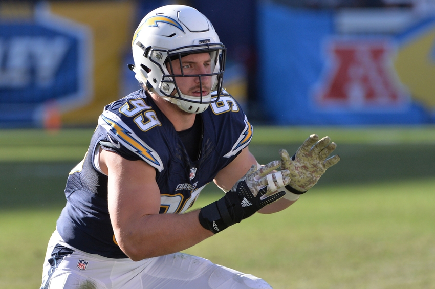 Nov 13, 2016; San Diego, CA, USA; San Diego Chargers defensive end Joey Bosa (99) raises his arms as he engages with a Miami Dolphins defender during the second quarter at Qualcomm Stadium. Mandatory Credit: Orlando Ramirez-USA TODAY Sports
