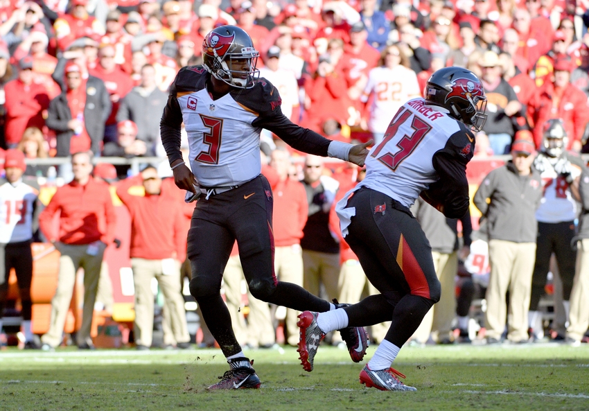 Nov 20, 2016; Kansas City, MO, USA; Tampa Bay Buccaneers quarterback Jameis Winston (3) hands off to running back Peyton Barber (43) during the second half against the Kansas City Chiefs at Arrowhead Stadium. Tampa Bay won 19-17. Mandatory Credit: Denny Medley-USA TODAY Sports