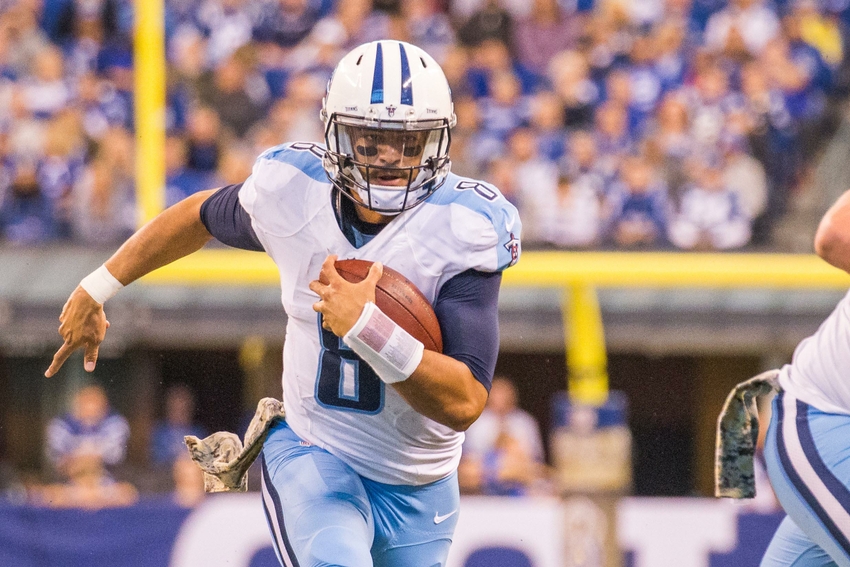 Nov 20, 2016; Indianapolis, IN, USA; Tennessee Titans quarterback Marcus Mariota (8) runs the ball in the second half of the game against the Indianapolis Colts at Lucas Oil Stadium. Indianapolis Colts beat the Tennessee Titans 24-17. Mandatory Credit: Trevor Ruszkowski-USA TODAY Sports