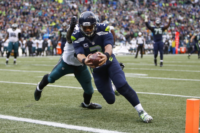 Nov 20, 2016; Seattle, WA, USA; Seattle Seahawks quarterback Russell Wilson (3) dives to the end zone for a touchdown against the Philadelphia Eagles during the third quarter at CenturyLink Field. Mandatory Credit: Joe Nicholson-USA TODAY Sports