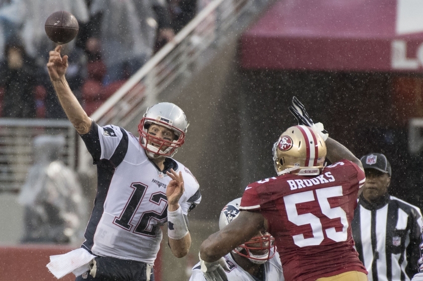 November 20, 2016; Santa Clara, CA, USA; New England Patriots quarterback Tom Brady (12) passes the football against San Francisco 49ers outside linebacker Ahmad Brooks (55) during the third quarter at Levi