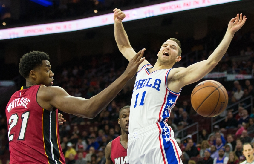 Nov 21, 2016; Philadelphia, PA, USA; Philadelphia 76ers guard Nik Stauskas (11) looses controls of the ball in front of Miami Heat center Hassan Whiteside (21) during the first quarter at Wells Fargo Center. Mandatory Credit: Bill Streicher-USA TODAY Sports