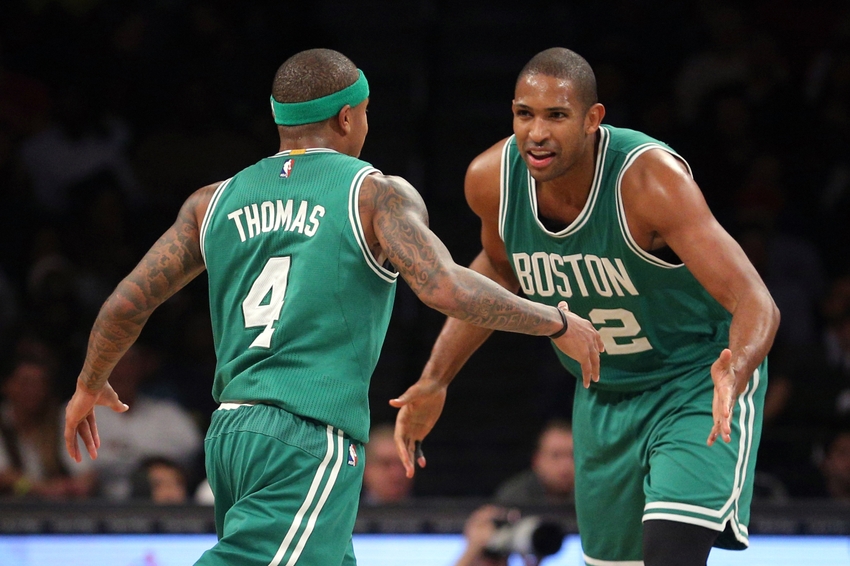 Boston Celtics point guard Isaiah Thomas (4) and Boston Celtics center Al Horford (42) are in today's DraftKings daily picks. Mandatory Credit: Brad Penner-USA TODAY Sports