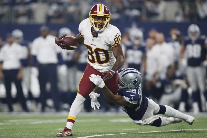 Nov 24, 2016; Arlington, TX, USA; Washington Redskins wide receiver Jamison Crowder (80) avoids the tackle of Dallas Cowboys cornerback Orlando Scandrick (32) in the fourth quarter at AT&T Stadium. Dallas won 31-26. Mandatory Credit: Tim Heitman-USA TODAY Sports