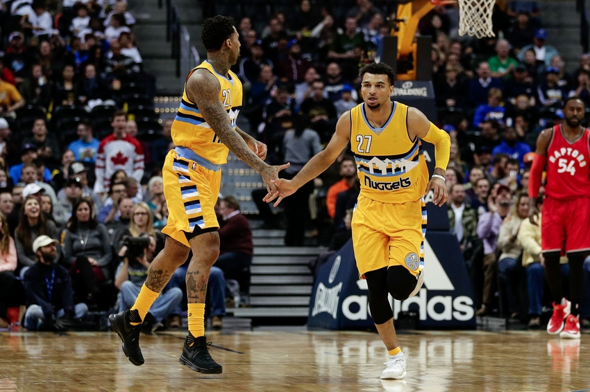 Nov 18, 2016; Denver, CO, USA; Denver Nuggets forward Wilson Chandler (21) and guard Jamal Murray (27) react after a play in the third quarter against the Toronto Raptors at the Pepsi Center. The Raptors won 113-111 in overtime. Mandatory Credit: Isaiah J. Downing-USA TODAY Sports