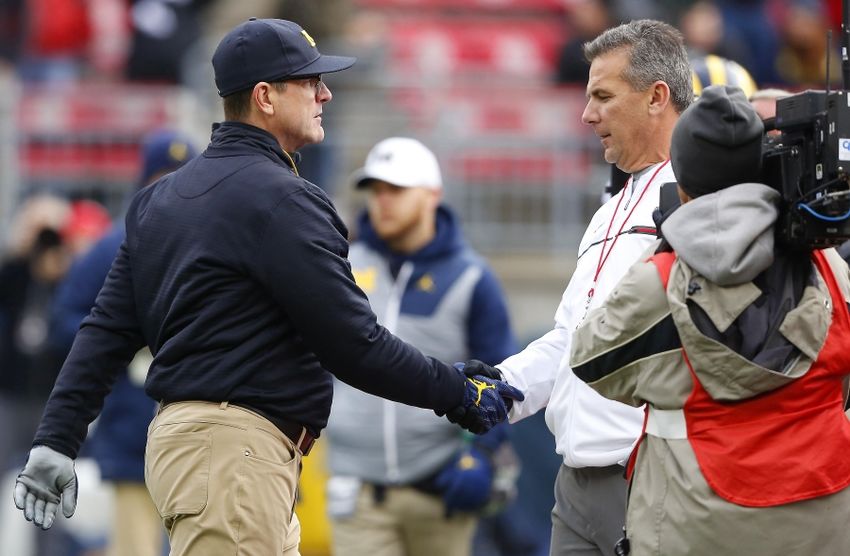 9705731-jim-harbaugh-urban-meyer-ncaa-football-michigan-ohio-state-1-850x556.jpg