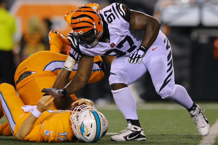 Sep 29, 2016; Cincinnati, OH, USA; Cincinnati Bengals defensive tackle Geno Atkins (97) sacks Miami Dolphins quarterback Ryan Tannehill (17) in the second half at Paul Brown Stadium. The Bengals won 22-7. Mandatory Credit: Aaron Doster-USA TODAY Sports