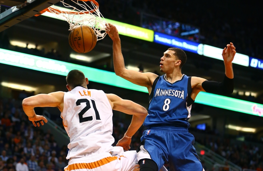 Nov 25, 2016; Phoenix, AZ, USA; Minnesota Timberwolves guard Zach LaVine (right) goes up for a dunk over Phoenix Suns center Alex Len in the first quarter at Talking Stick Resort Arena. Mandatory Credit: Mark J. Rebilas-USA TODAY Sports
