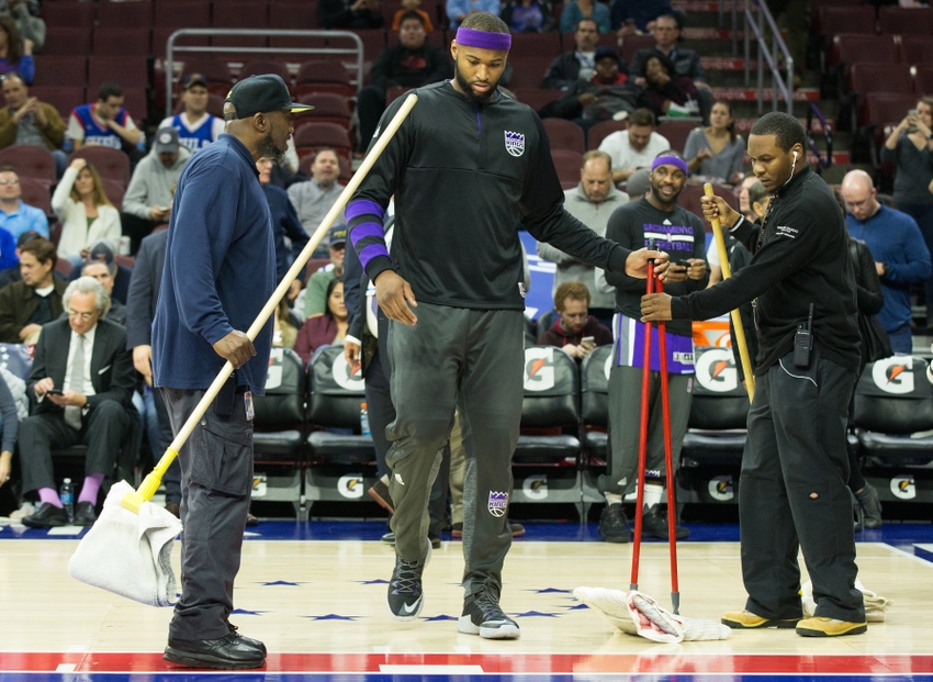 Sacramento Kings center DeMarcus Cousins (middle) was looking for any way to contribute in yesterday's FanDuel daily picks. Mandatory Credit: Bill Streicher-USA TODAY Sports