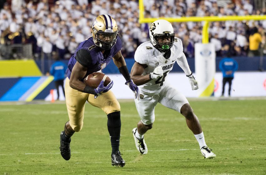 December 2, 2016; Santa Clara, CA, USA; Washington Huskies wide receiver John Ross (1) runs against Colorado Buffaloes defensive back Chidobe Awuzie (4) during the third quarter in the Pac-12 championship at Levi's Stadium. The Huskies defeated the Buffaloes 41-10. Mandatory Credit: Kyle Terada-USA TODAY Sports