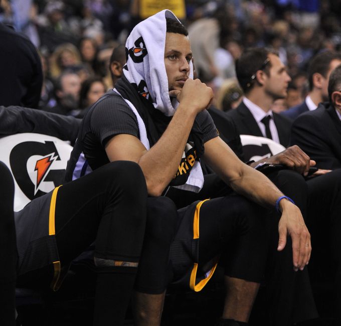 Dec 10, 2016; Memphis, TN, USA; Golden State Warriors guard Stephen Curry (30) sits on the bench during the second half against the Memphis Grizzlies at FedExForum. The Grizzlies won 110-89. Mandatory Credit: Justin Ford-USA TODAY Sports