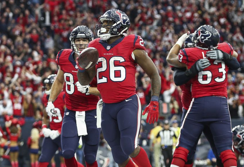Dec 18, 2016; Houston, TX, USA; Houston Texans running back Lamar Miller (26) celebrates after scoring a touchdown during the fourth quarter against the Jacksonville Jaguars at NRG Stadium. Mandatory Credit: Troy Taormina-USA TODAY Sports