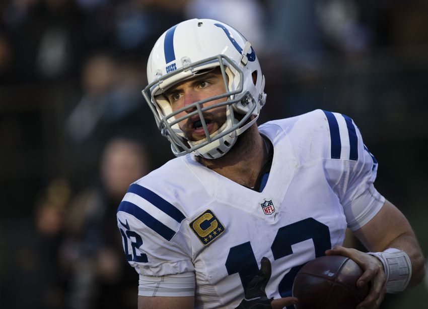 Dec 24, 2016; Oakland, CA, USA; Indianapolis Colts quarterback Andrew Luck (12) after scoring a touchdown against the Oakland Raiders during the fourth quarter at the Oakland Coliseum. The Oakland Raiders defeated the Indianapolis Colts 33-25. Mandatory Credit: Kelley L Cox-USA TODAY Sports