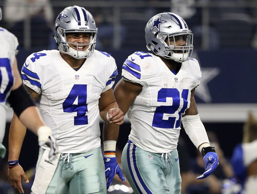 Dec 26, 2016; Arlington, TX, USA; Dallas Cowboys quarterback Dak Prescott (4) and running back Ezekiel Elliott (21) during the game against the Detroit Lions at AT&T Stadium. Mandatory Credit: Kevin Jairaj-USA TODAY Sports