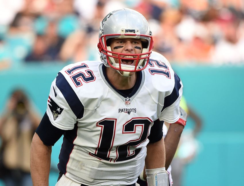 Jan 1, 2017; Miami Gardens, FL, USA; New England Patriots quarterback Tom Brady (12) yells out at the line of scrimmage during the second half against the Miami Dolphins at Hard Rock Stadium. Mandatory Credit: Steve Mitchell-USA TODAY Sports