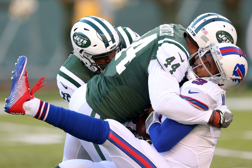 Jan 1, 2017; East Rutherford, NJ, USA; Buffalo Bills quarterback EJ Manuel (3) fumbles the ball after being sacked by New York Jets linebacker Corey Lemonier (44) and New York Jets linebacker Jordan Jenkins (48) during the third quarter at MetLife Stadium. Mandatory Credit: Brad Penner-USA TODAY Sports