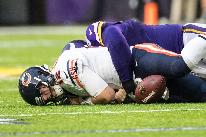 Jan 1, 2017; Minneapolis, MN, USA; Minnesota Vikings defensive tackle Linval Joseph (98) forces a fumble on Chicago Bears quarterback Matt Barkley (12) during the fourth quarter at U.S. Bank Stadium. Mandatory Credit: Brace Hemmelgarn-USA TODAY Sports