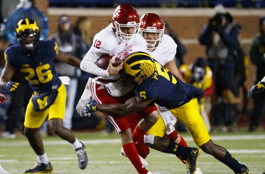 Nov 19, 2016; Ann Arbor, MI, USA; Indiana Hoosiers quarterback Zander Diamont (12) is sacked by Michigan Wolverines linebacker Jabrill Peppers (5) in the second half at Michigan Stadium. Michigan won 20-10. Mandatory Credit: Rick Osentoski-USA TODAY Sports