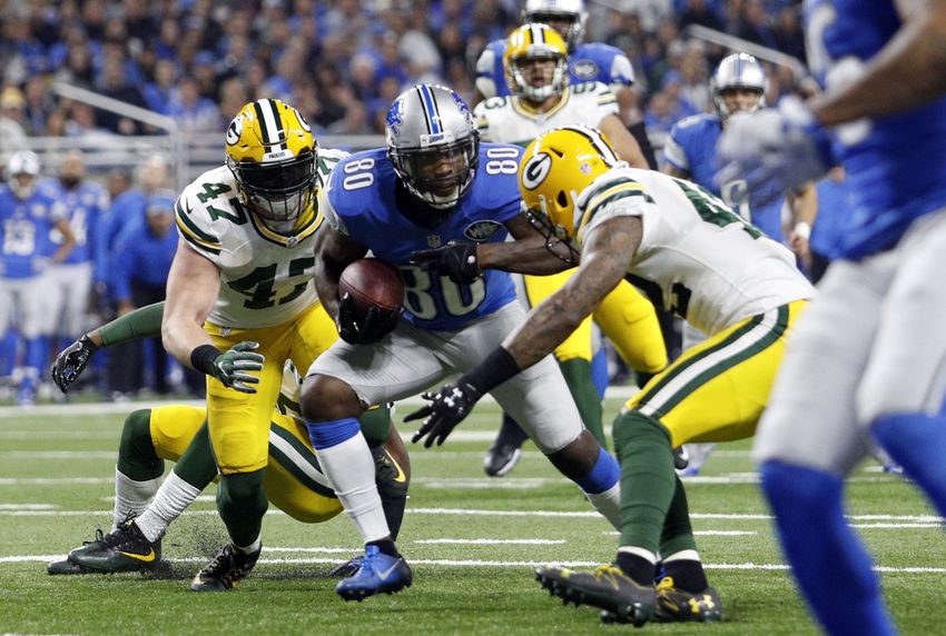 Jan 1, 2017; Detroit, MI, USA; Detroit Lions wide receiver Anquan Boldin (80) runs after a catch against Green Bay Packers inside linebacker Jake Ryan (47) and strong safety Morgan Burnett (42) during the second quarter at Ford Field. Mandatory Credit: Raj Mehta-USA TODAY Sports