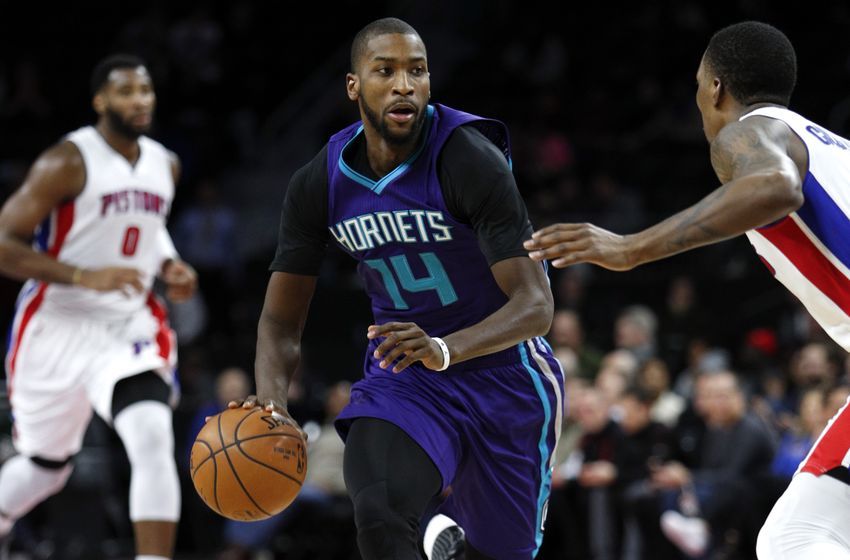 Jan 5, 2017; Auburn Hills, MI, USA; Charlotte Hornets forward Michael Kidd-Gilchrist (14) gets defended by Detroit Pistons guard Kentavious Caldwell-Pope (5) during the second quarter at The Palace of Auburn Hills. Mandatory Credit: Raj Mehta-USA TODAY Sports