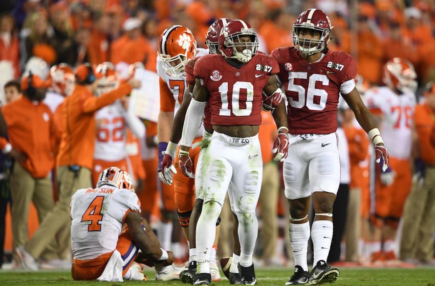 Jan 9, 2017; Tampa, FL, USA; Clemson Tigers quarterback Deshaun Watson (4) reacts after bring brought down by Alabama Crimson Tide linebacker Reuben Foster (10) during the second quarter in the 2017 College Football Playoff National Championship Game at Raymond James Stadium. Mandatory Credit: John David Mercer-USA TODAY Sports