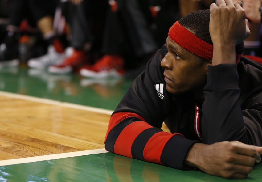 Nov 2, 2016; Boston, MA, USA; Chicago Bulls point guard Rajon Rondo (9) watches the game from the side line while laying on the floor during the fourth quarter against the Boston Celtics at TD Garden. The Boston Celtics won 107-100. Mandatory Credit: Greg M. Cooper-USA TODAY Sports