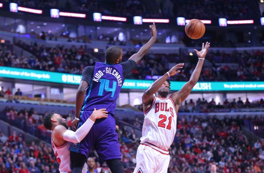 Jan 2, 2017; Chicago, IL, USA; Chicago Bulls forward Jimmy Butler (21) and Charlotte Hornets forward Michael Kidd-Gilchrist (14) compete for a rebound during the first half at the United Center. Mandatory Credit: Dennis Wierzbicki-USA TODAY Sports