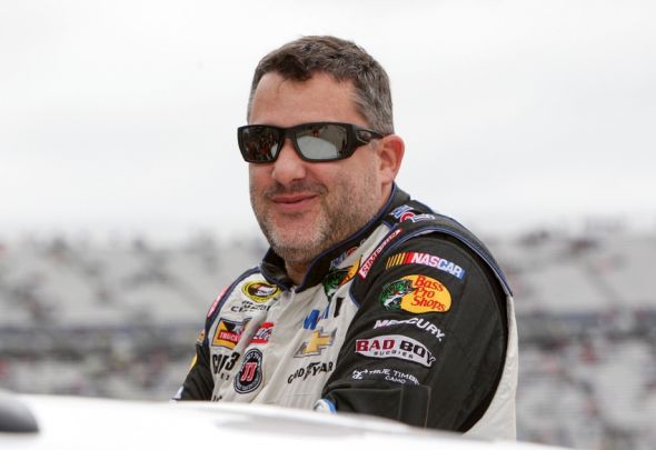 Oct 4, 2015; Dover, DE, USA; NASCAR Sprint Cup Series driver Tony Stewart prior to the AAA 400 at Dover International Speedway. Mandatory Credit: Matthew O