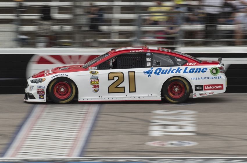 Apr 8, 2016; Fort Worth, TX, USA; Sprint Cup Series driver Ryan Blaney (21) drives down the front stretch during qualifying for the Duck Commander 500 at Texas Motor Speedway. Blaney will start in seventh position. Mandatory Credit: Jerome Miron-USA TODAY Sports