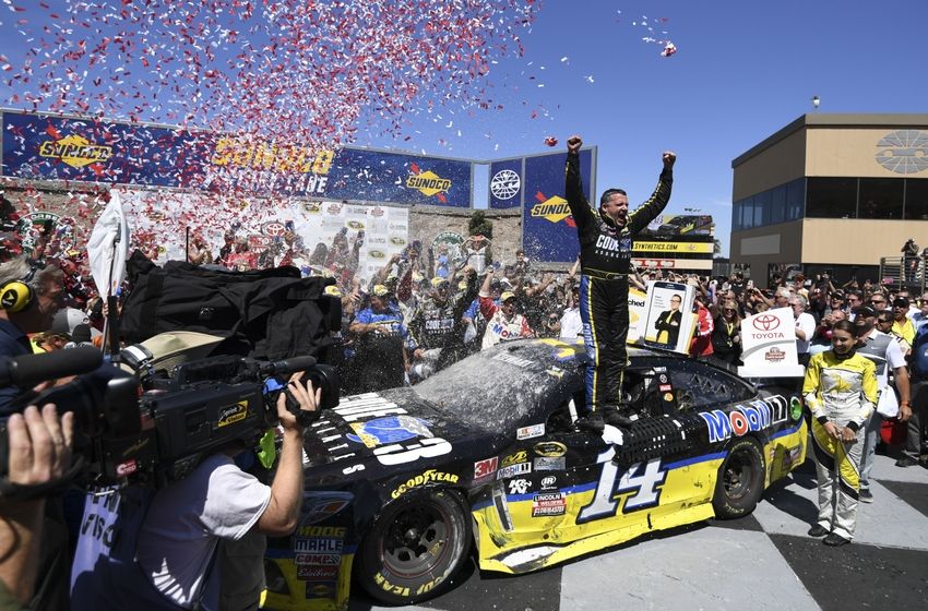 June 26, 2016; Sonoma, CA, USA; Sprint Cup Series driver Tony Stewart (14) celebrates in victory lane during the Toyota Save Mart 350 at Sonoma Raceway. Mandatory Credit: Kyle Terada-USA TODAY Sports