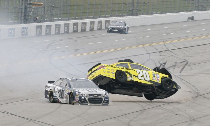 May 1, 2016; Talladega, AL, USA; NASCAR Sprint Cup Series driver Danica Patrick (10) and driver Matt Kenseth (20) crash during the GEICO 500 at Talladega Superspeedway. Mandatory Credit: Marvin Gentry-USA TODAY Sports