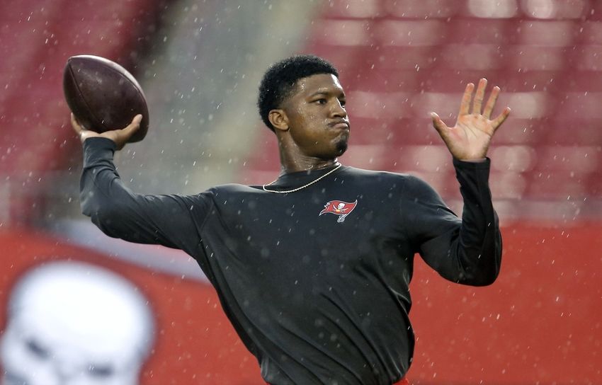 Aug 31, 2016; Tampa, FL, USA; Tampa Bay Buccaneers quarterback Jameis Winston (3) warms up in a steady rain from a weather band spawned by Tropical Storm Hermine before a football game against the Washington Redskins at Raymond James Stadium. Mandatory Credit: Reinhold Matay-USA TODAY Sports
