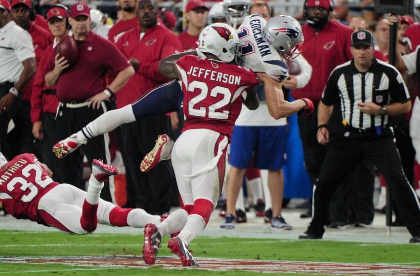 Sep 11, 2016; Glendale, AZ, USA; New England Patriots wide receiver Julian Edelman (11) is pushed out of bounds by Arizona Cardinals strong safety Tony Jefferson (22) during the first half at University of Phoenix Stadium. Mandatory Credit: Matt Kartozian-USA TODAY Sports