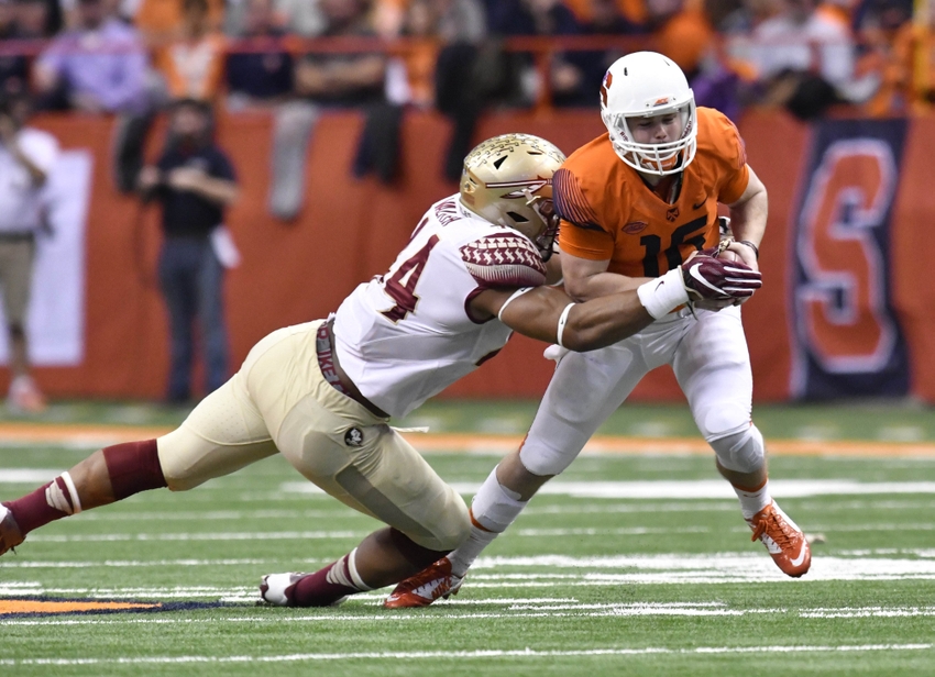Nov 19, 2016; Syracuse, NY, USA; Syracuse Orange quarterback Zack Mahoney (16) is sacked by Florida State Seminoles defensive end DeMarcus Walker (44) during the first quarter of a game at the Carrier Dome. Mandatory Credit: Mark Konezny-USA TODAY Sports