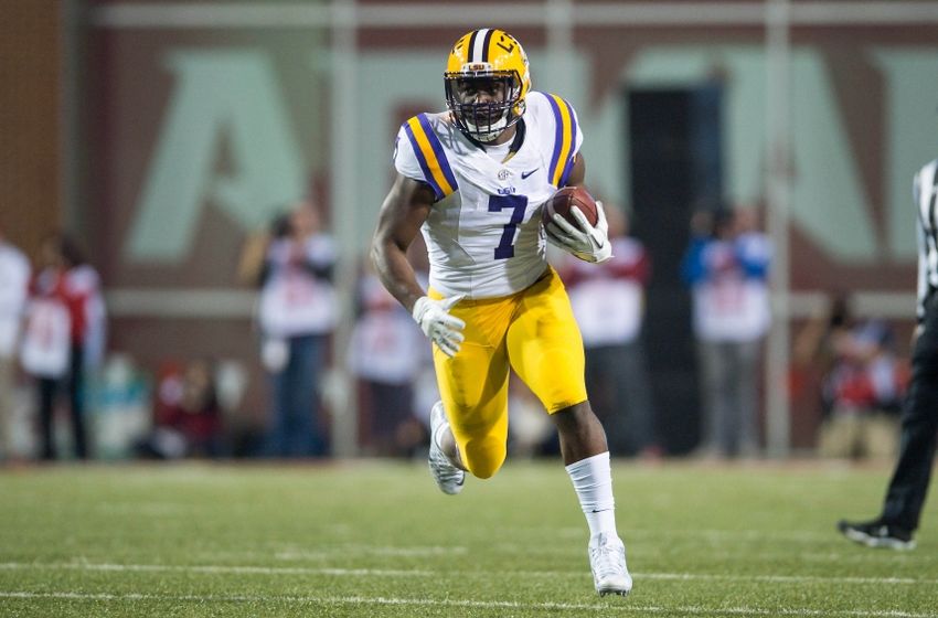Nov 12, 2016; Fayetteville, AR, USA; LSU Tigers running back Leonard Fournette (7) runs for a large gain after a reception during the first quarter of the game against the Arkansas Razorbacks at Donald W. Reynolds Razorback Stadium. Mandatory Credit: Brett Rojo-USA TODAY Sports