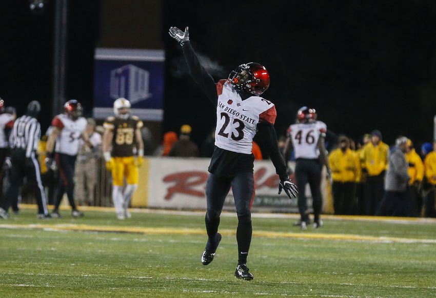 Dec 3, 2016; Laramie, WY, USA; San Diego State Aztecs cornerback Damontae Kazee (23) waves to the crowd after game against the Wyoming Cowboys at the Mountain West Championship college football game at War Memorial Stadium. The Aztecs beat the Cowboys 27-24. Mandatory Credit: Troy Babbitt-USA TODAY Sports