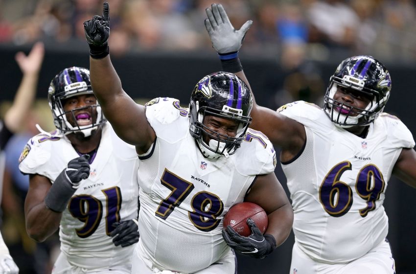 Sep 1, 2016; New Orleans, LA, USA; Baltimore Ravens defensive tackle Michael Pierce (78) celebrates his fumble recovery for a touchdown with teammates Matt Judon (91) and Willie Henry (69) during the second quarter of their game against the New Orleans Saints at the Mercedes-Benz Superdome. Mandatory Credit: Chuck Cook-USA TODAY Sports