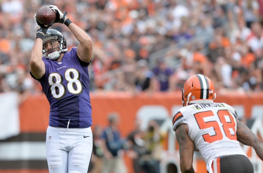 Sep 18, 2016; Cleveland, OH, USA; Baltimore Ravens tight end Dennis Pitta (88) catches a pass over the defense of Cleveland Browns inside linebacker Chris Kirksey (58) during the second half at FirstEnergy Stadium. The Ravens won 25-20. Mandatory Credit: Ken Blaze-USA TODAY Sports