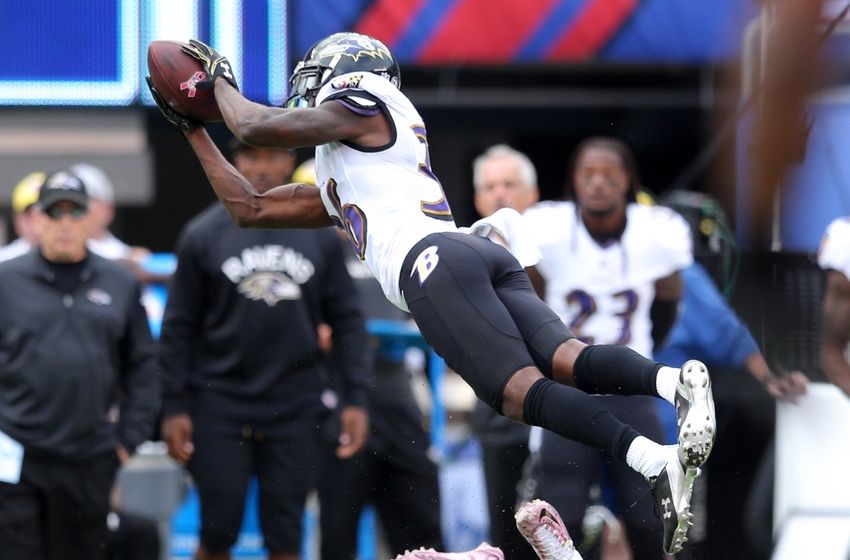 Oct 16, 2016; East Rutherford, NJ, USA; Baltimore Ravens corner back Tavon Young (36) intercepts a pass intended for New York Giants wide receiver Sterling Shepard (87) during the third quarter at MetLife Stadium. Mandatory Credit: Brad Penner-USA TODAY Sports