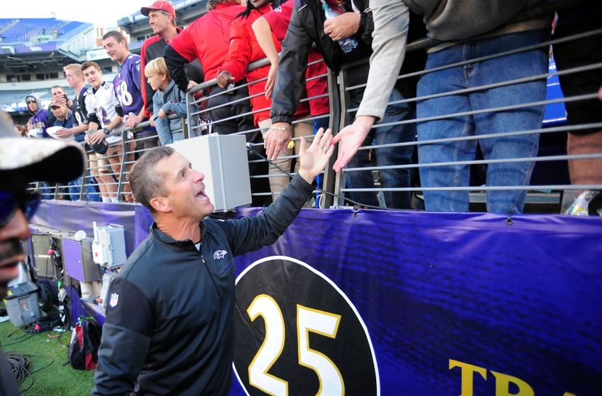 Nov 6, 2016; Baltimore, MD, USA; Baltimore Ravens head coach John Harbaugh (left) high fives fans after beating the Pittsburgh Steelers 21-14 at M&T Bank Stadium. Mandatory Credit: Evan Habeeb-USA TODAY Sports