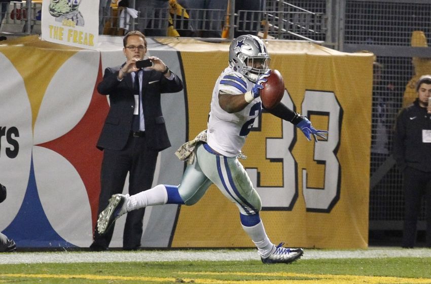 Nov 13, 2016; Pittsburgh, PA, USA; Dallas Cowboys running back Ezekiel Elliott (21) celebrates his thirty-two yard touchdown to win the game against the Pittsburgh Steelers during the fourth quarter at Heinz Field. Dallas won 35-30. Mandatory Credit: Charles LeClaire-USA TODAY Sports