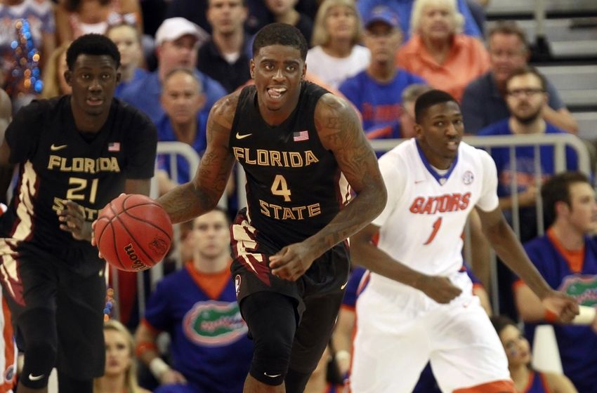 Dec 29, 2015; Gainesville, FL, USA; Florida State Seminoles guard Dwayne Bacon (4) drives to the basket against the Florida Gators during the first half at Stephen C. O'Connell Center. Mandatory Credit: Kim Klement-USA TODAY Sports