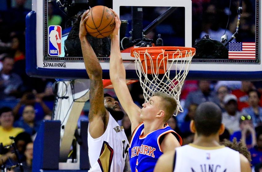Mar 28, 2016; New Orleans, LA, USA; New York Knicks forward Kristaps Porzingis (6) blocks a dunk attempt by New Orleans Pelicans forward Alonzo Gee (15) during the second quarter of a game at the Smoothie King Center. Mandatory Credit: Derick E. Hingle-USA TODAY Sports