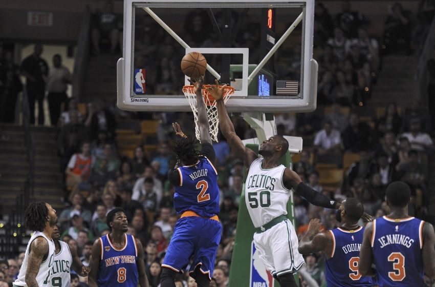 Oct 19, 2016; Boston, MA, USA; New York Knicks forward Maurice Daly Ndour (2) lays the ball past the reach of Boston Celtics forward Ben Bentil (50) during the second half at TD Garden. Mandatory Credit: Bob DeChiara-USA TODAY Sports